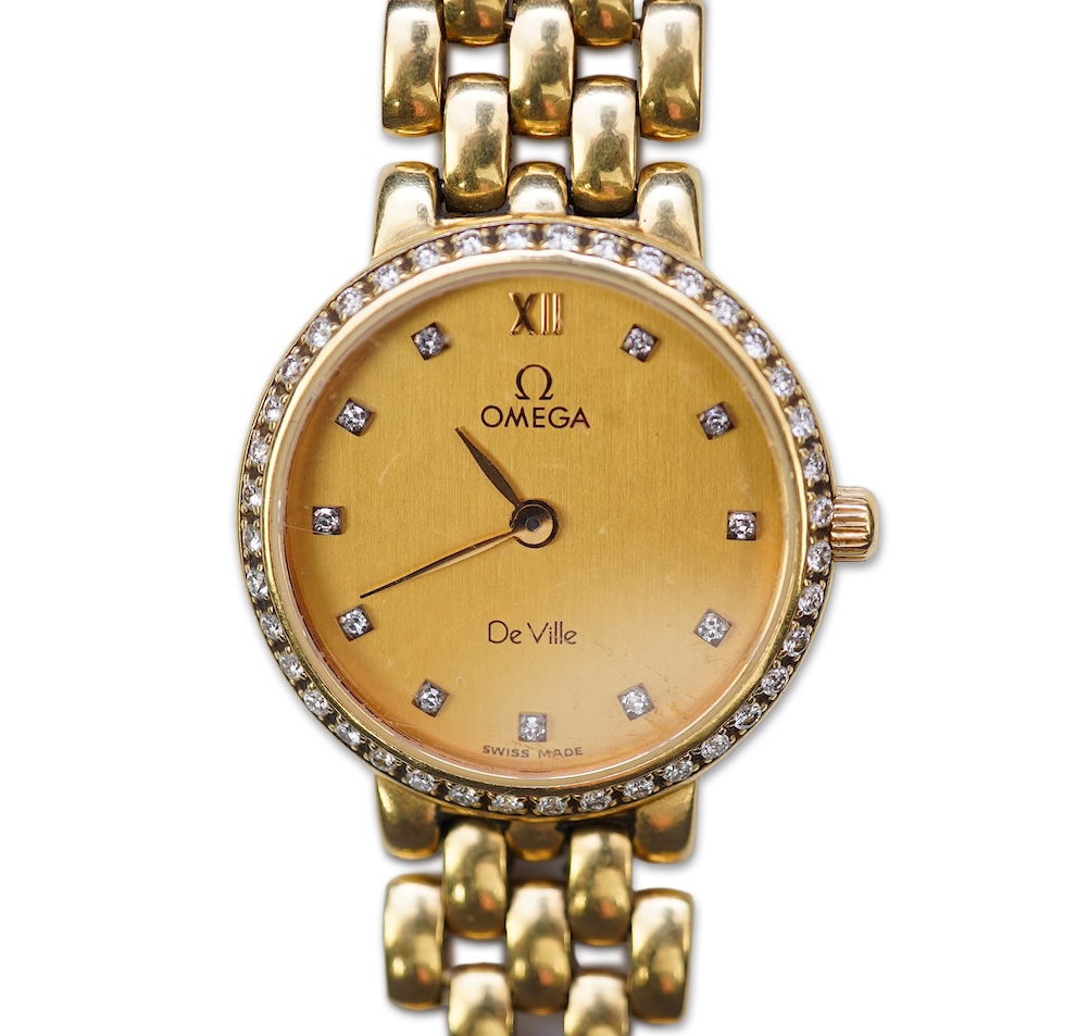 Omega, a lady's 18ct gold and diamond 'De Ville' wristwatch
